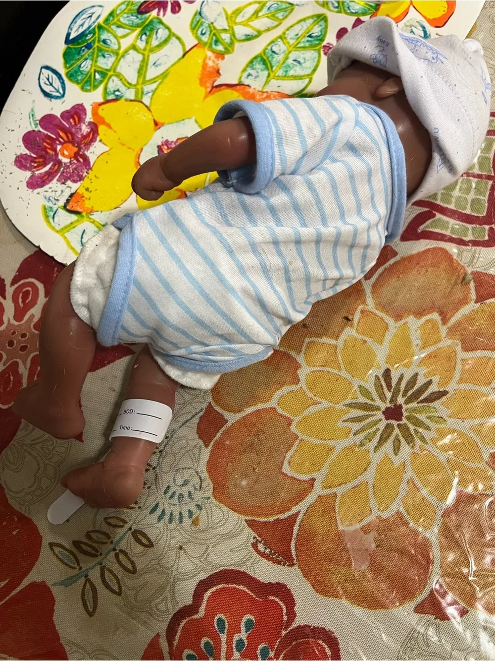 Reborn Brown Baby Doll with Blue & White Striped Outfit
